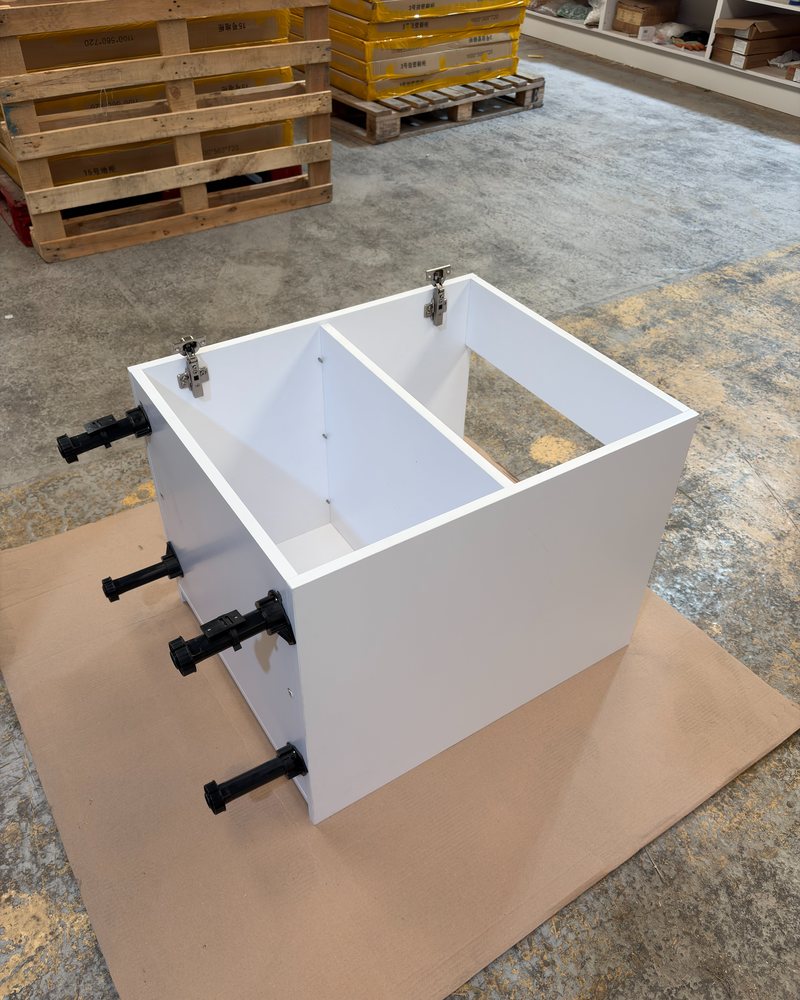 Base cabinet carcass with adjustable legs