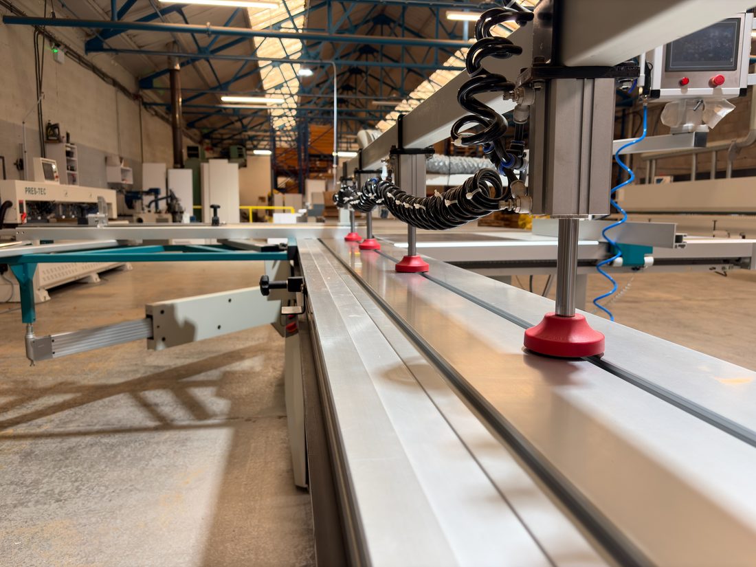The beam saw and edgebander line running through our Blackburn factory