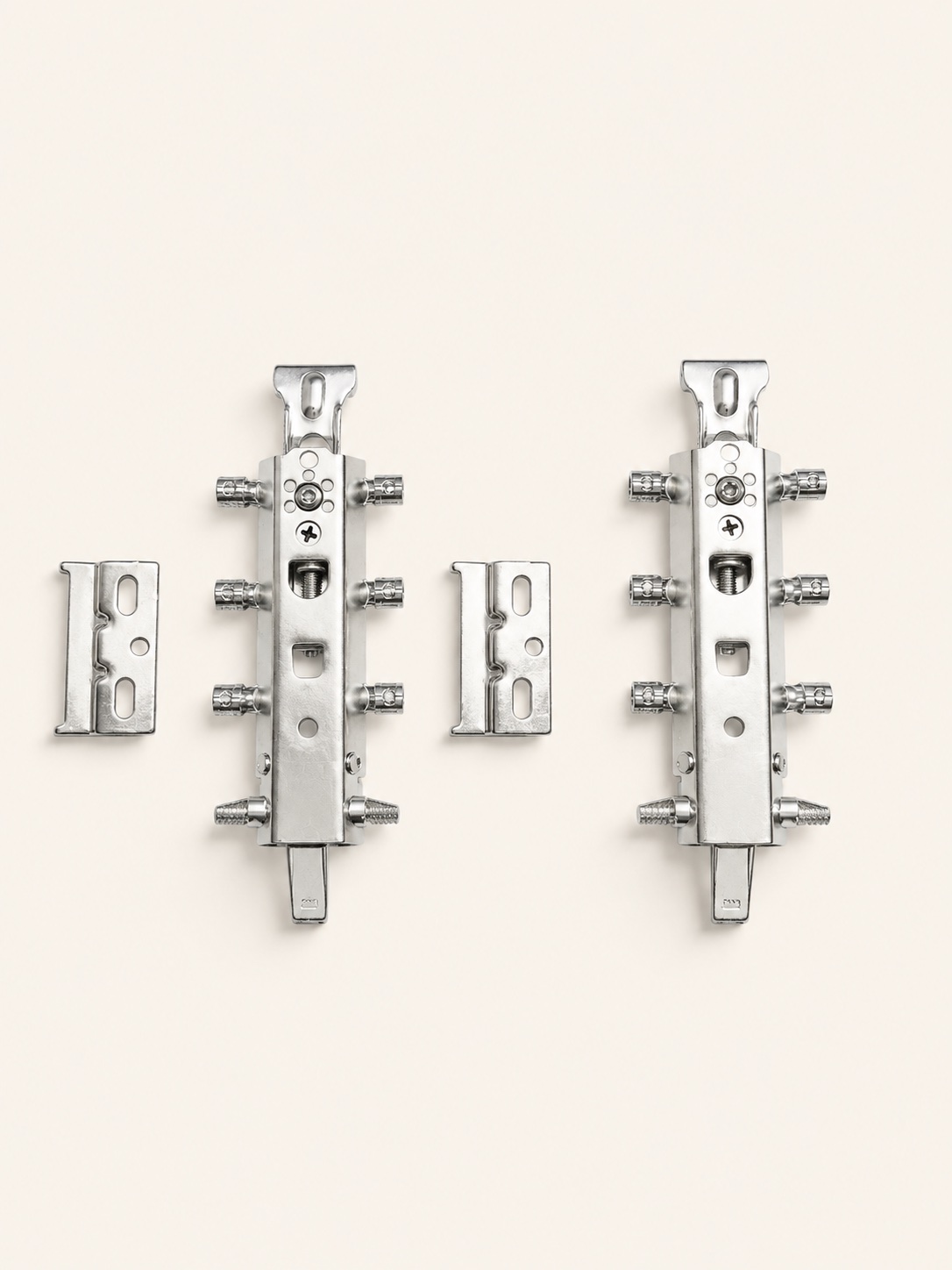 A pair of adjustable wall hangers with their wall plates