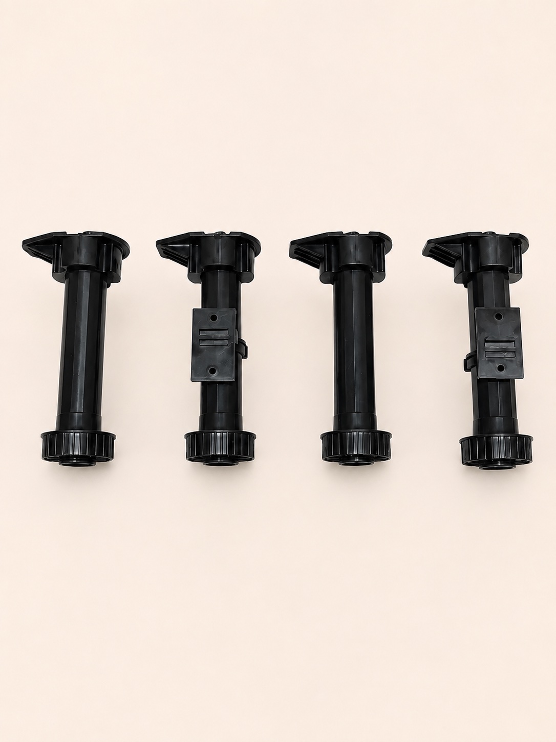 Four adjustable cabinet legs with clip-on plinth brackets